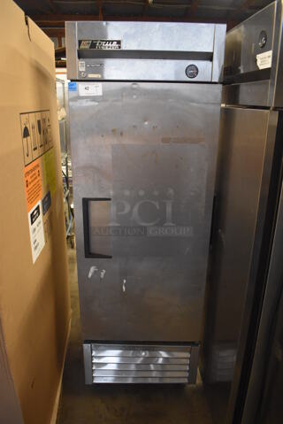 2013 True T-23F ENERGY STAR Stainless Steel Commercial Single Door Reach In Freezer w/ Poly Coated Racks on Commercial Casters. 115 Volts, 1 Phase. 27x30x83. Tested and Working!