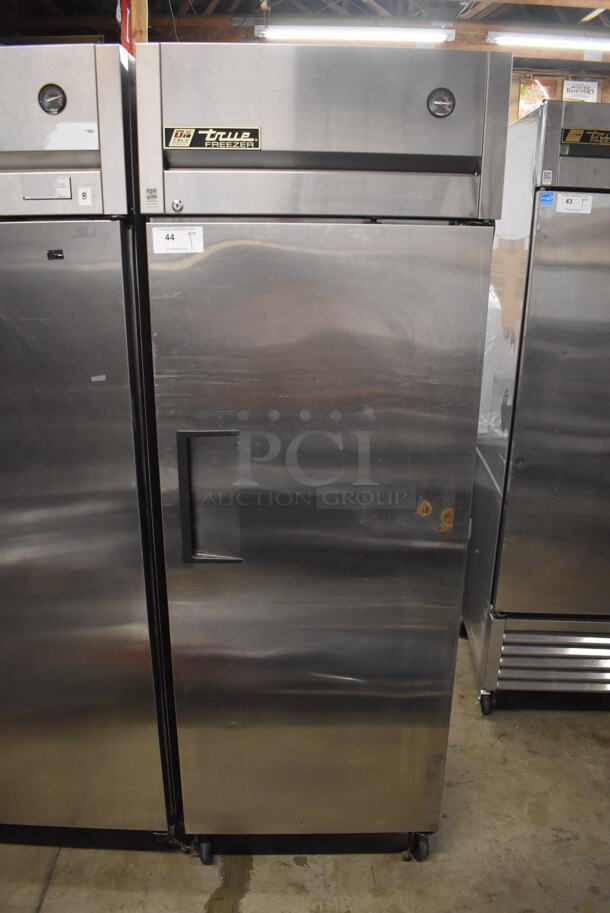 2011 True TG1F-1S Stainless Steel Commercial Single Door Reach In Freezer w/ Poly Coated Racks on Commercial Casters. 115 Volts, 1 Phase. 29x35x83. Tested and Working!