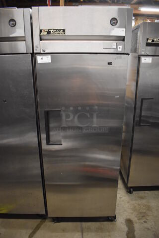 True TG1F-1S Stainless Steel Commercial Single Door Reach In Freezer w/ Poly Coated Racks on Commercial Casters. 115 Volts, 1 Phase. 29x35x83. Tested and Working!