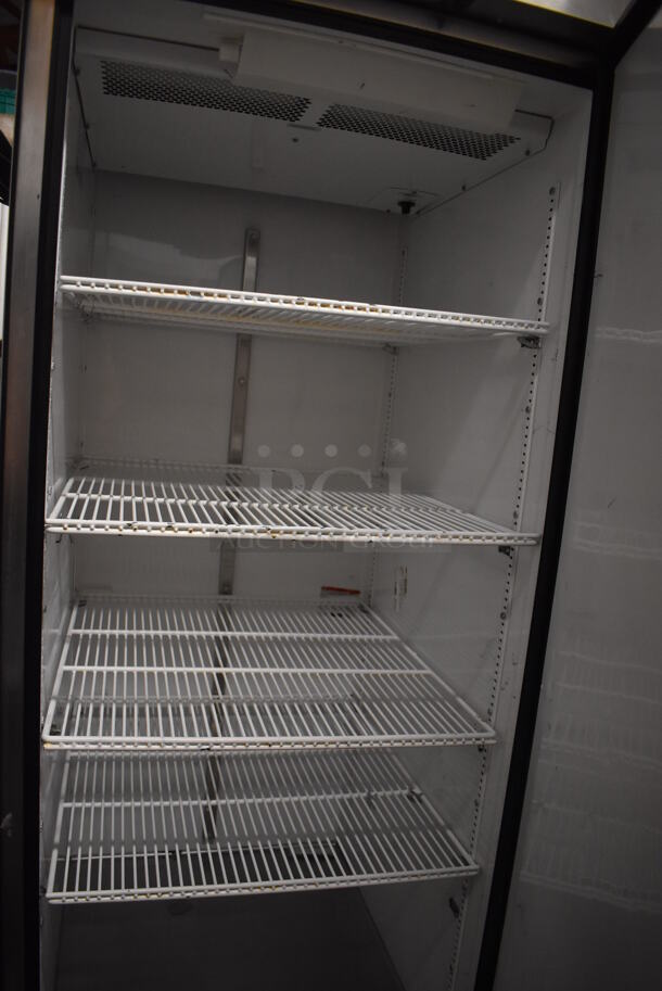 True TG1F-1S Stainless Steel Commercial Single Door Reach In Freezer w/ Poly Coated Racks on Commercial Casters. 115 Volts, 1 Phase. 29x35x83. Tested and Working! - Image 5 of 6