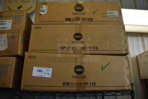 3 Boxes of Various Minolta Paper Feed Units; PF-108 and PF-118. 3 Times Your Bid!