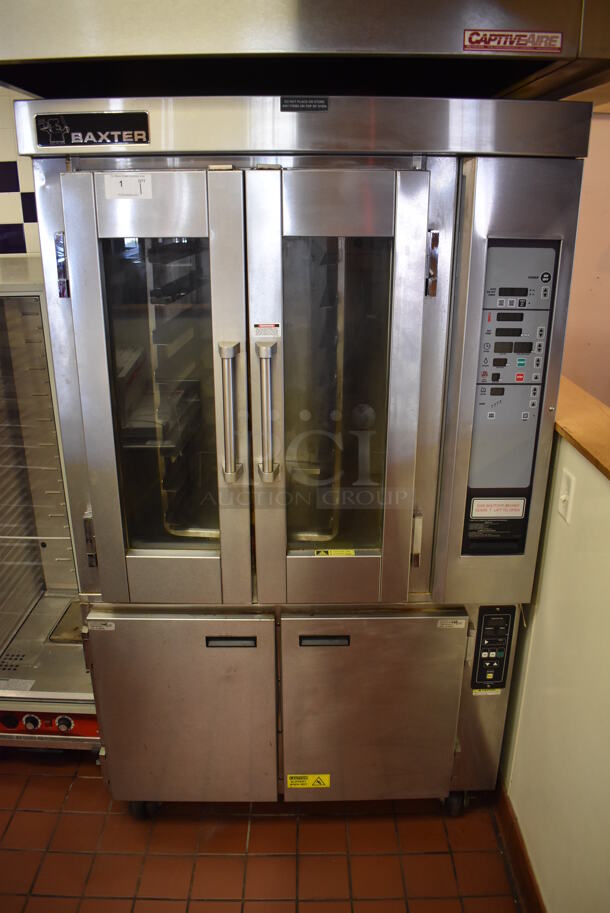 Baxter OV300G Stainless Steel Commercial Floor Style Natural Gas Powered Mini Rotating Rack Oven w/ Lower 2 Door Proofer Cabinet on Commercial Casters. Proofer Needs a New Circuit Board. Oven Was In Working Condition When Restaurant Closed. BUYER MUST REMOVE. (Front Kitchen)