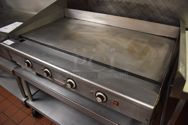 Vulcan Stainless Steel Commercial Countertop Natural Gas Powered Flat Top Griddle on Stainless Steel Equipment Stand w/ Under Shelf and Commercial Casters. Unit Was In Working Condition When Restaurant Closed. BUYER MUST REMOVE. (Front Kitchen) - Image 3 of 8