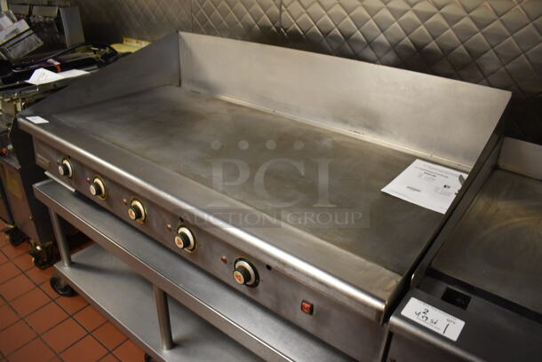 Vulcan Stainless Steel Commercial Countertop Natural Gas Powered Flat Top Griddle w/ Thermostatic Controls on Stainless Steel Equipment Stand w/ Under Shelf and Commercial Casters. Unit Was In Working Condition When Restaurant Closed. BUYER MUST REMOVE. (Front Kitchen) - Image 3 of 11