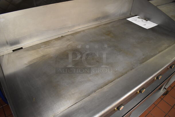 Vulcan Stainless Steel Commercial Countertop Natural Gas Powered Flat Top Griddle w/ Thermostatic Controls on Stainless Steel Equipment Stand w/ Under Shelf and Commercial Casters. Unit Was In Working Condition When Restaurant Closed. BUYER MUST REMOVE. (Front Kitchen) - Image 8 of 11