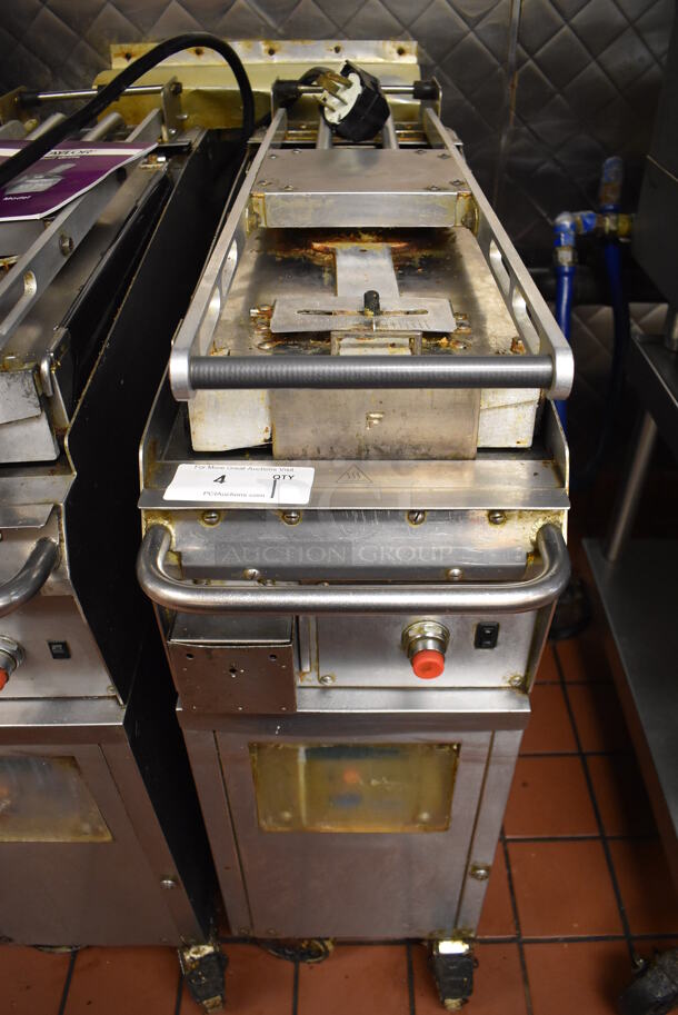 Taylor QS11 Stainless Steel Commercial Electric Powered Clamshell Flat Top Griddle on Commercial Casters. 250 Volts, 3 Phase. Unit Was In Working Condition When Restaurant Closed. (Front Kitchen)