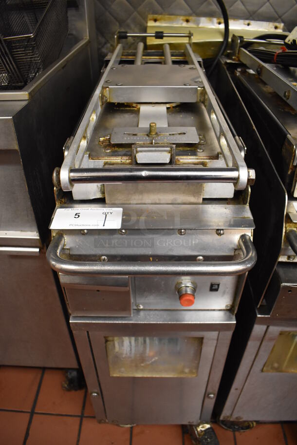 Taylor QS11 Stainless Steel Commercial Electric Powered Clamshell Flat Top Griddle on Commercial Casters. 250 Volts, 3 Phase. Unit Was In Working Condition When Restaurant Closed. (Front Kitchen)