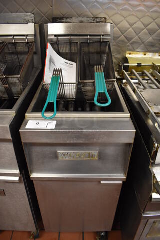 Vulcan 1GR45M Stainless Steel Commercial Floor Style Natural Gas Powered Deep Fat Fryer w/ 2 Metal Fry Baskets on Commercial Casters. 120,000 BTU. Unit Was In Working Condition When Restaurant Closed. BUYER MUST REMOVE. (Front Kitchen)