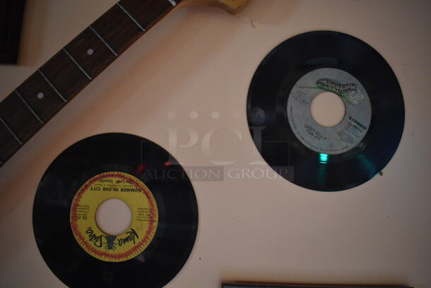 ALL ONE MONEY! Wall Lot of Various Pictures Including the Rolling Stones and Records. Does Not Include Guitar. BUYER MUST REMOVE. (Dining Room) - Image 7 of 8