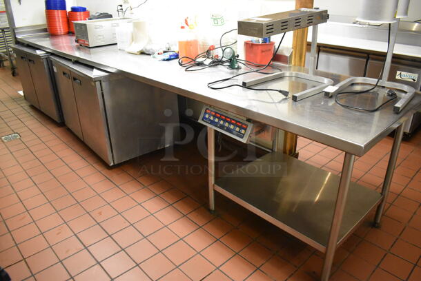 Stainless Steel Commercial Table w/ Partial Back Splash and Semi Under Shelf. (Front Kitchen)