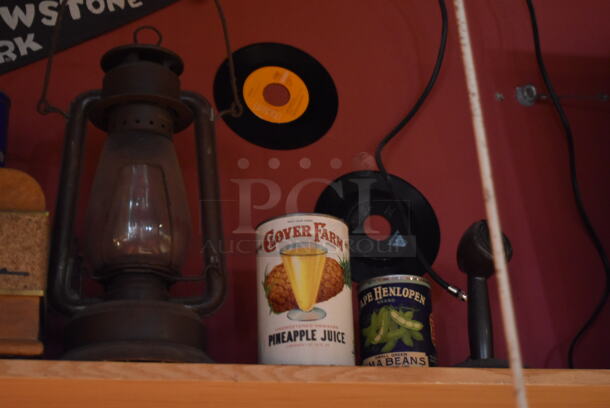 ALL ONE MONEY! Shelf Lot of Various Items Including Helmet, Fan and Trophy and Wall Decor Above The Shelf. Does Not Include The Shelf Itself or The Television. BUYER MUST REMOVE. (Dining Room) - Image 4 of 5