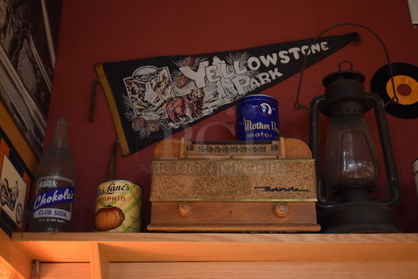 ALL ONE MONEY! Shelf Lot of Various Items Including Helmet, Fan and Trophy and Wall Decor Above The Shelf. Does Not Include The Shelf Itself or The Television. BUYER MUST REMOVE. (Dining Room) - Image 5 of 5