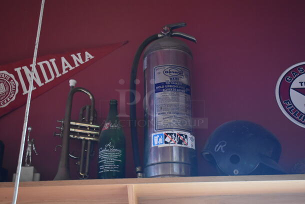 ALL ONE MONEY! Shelf Lot of Various Items Including Bottles, Tank and Luggage and Wall Decor Above The Shelf. Does Not Include The Shelf Itself. BUYER MUST REMOVE. (Dining Room) - Image 4 of 7