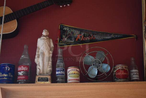 ALL ONE MONEY! Shelf Lot of Various Items Including Bottles, Tank and Luggage and Wall Decor Above The Shelf. Does Not Include The Shelf Itself. BUYER MUST REMOVE. (Dining Room) - Image 7 of 7