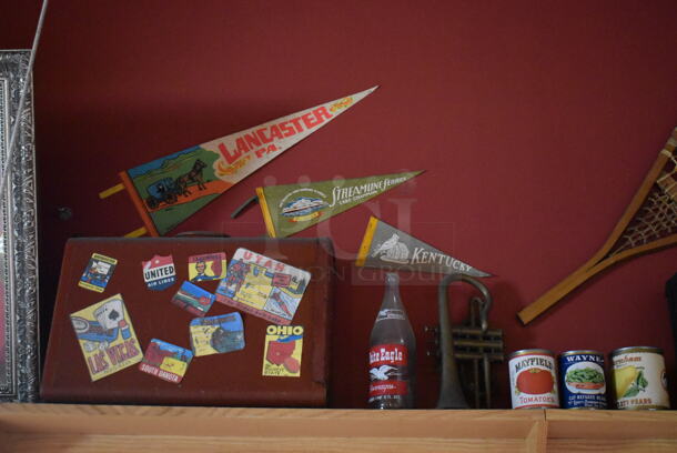 ALL ONE MONEY! Shelf Lot of Various Items Including Bottles, Tank and Luggage and Wall Decor Above The Shelf. Does Not Include The Shelf Itself. BUYER MUST REMOVE. (Dining Room) - Image 7 of 7