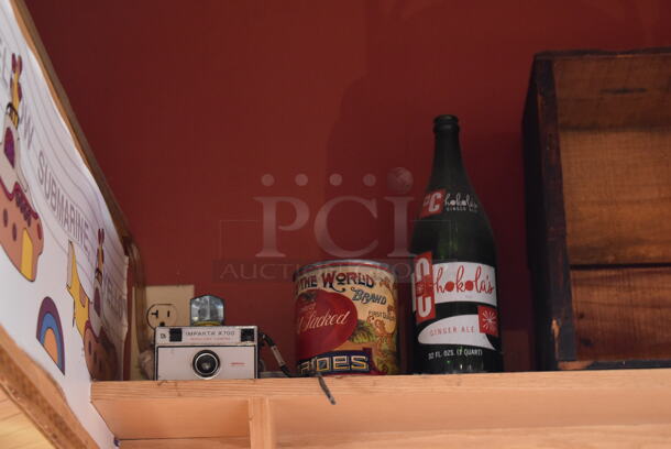 ALL ONE MONEY! Shelf Lot of Various Items Including Bottles and Lantern and Wall Decor Above The Shelf. Does Not Include The Shelf Itself. BUYER MUST REMOVE. (Dining Room) - Image 4 of 4