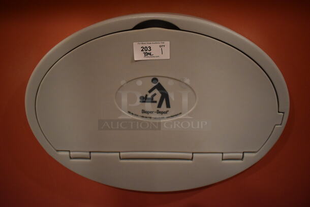 Gray Poly Wall Mount Diaper Changing Station. BUYER MUST REMOVE. (Womens Restroom)