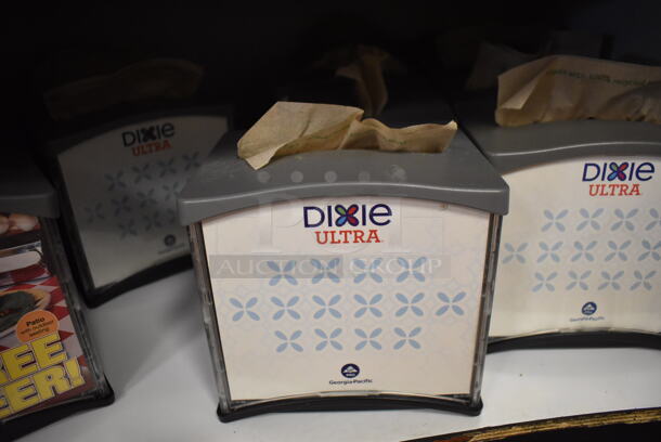 23 Dixie Gray and Black Poly Napkin Dispensers. 23 Times Your Bid! (Front Kitchen)