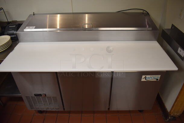 Avantco 178PICL260HC Stainless Steel Commercial Pizza Prep Table w/ Over Sized Cutting Board on Commercial Casters. 115 Volts, 1 Phase. Unit Was In Working Condition When Restaurant Closed. (Front Kitchen)