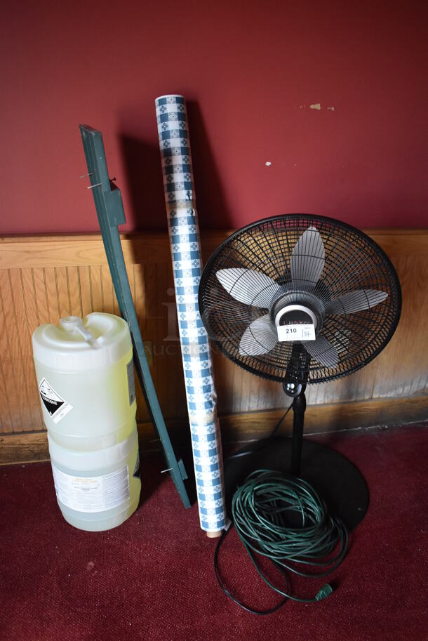 ALL ONE MONEY! Lot of Various Items Including Fan, Tablecloth Roll and 2 Barrels of Cleaner. (Side Dining Room) - Image 1 of 4