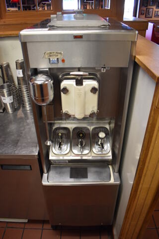 Taylor 441-27 Stainless Steel Commercial Floor Style Air Cooled Single Flavor Shake Freezer on Commercial Casters. 208-230 Volts, 1 Phase. Unit Was In Working Condition When Restaurant Closed. (Front Kitchen)