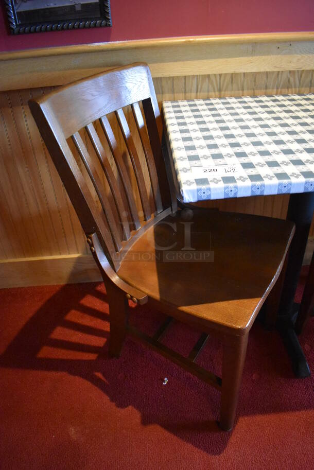 Table w/ Table Cloth on Black Metal Table Base and 2 Wooden Dining Chairs. Stock Picture - Cosmetic Condition May Vary. 30X24X28, 18x16x36. (Dining Room)

 - Image 2 of 4