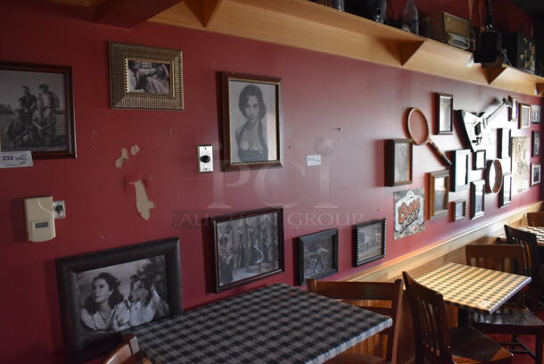 ALL ONE MONEY! Wall Lot of Various Pictures Including Audrey Hepburn, Tennis Racket and Actors. BUYER MUST REMOVE. (Party Dining Room) - Image 1 of 10