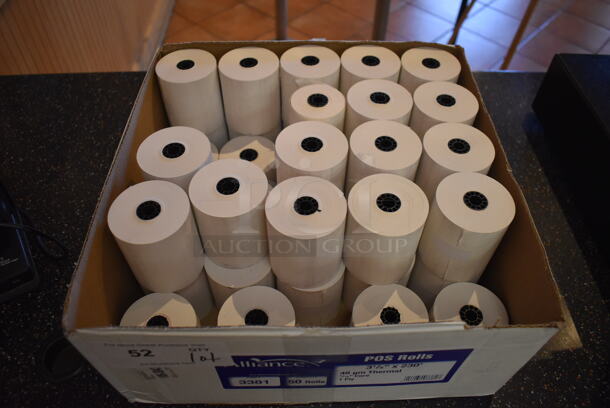 Box of Receipt Printer Paper Rolls. (Front Kitchen)