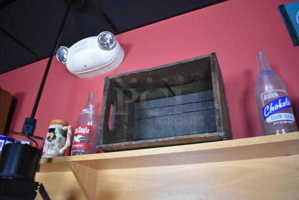 ALL ONE MONEY! Shelf Lot of Various Items Including Crates, Bottles and Luggage and Wall Decor Above The Shelf. Does Not Include The Shelf Itself. BUYER MUST REMOVE. (Party Dining Room) - Image 4 of 8