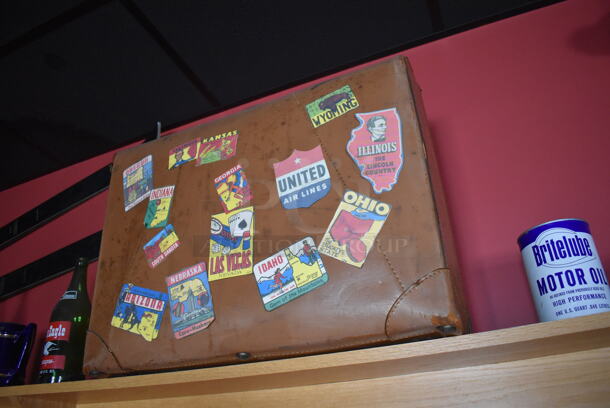 ALL ONE MONEY! Shelf Lot of Various Items Including Crates, Bottles and Luggage and Wall Decor Above The Shelf. Does Not Include The Shelf Itself. BUYER MUST REMOVE. (Party Dining Room) - Image 6 of 8