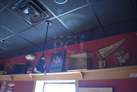 ALL ONE MONEY! Shelf Lot of Various Items Including Fan and Crates and Wall Decor Above The Shelf. Does Not Include The Shelf Itself. BUYER MUST REMOVE. (Party Dining Room)