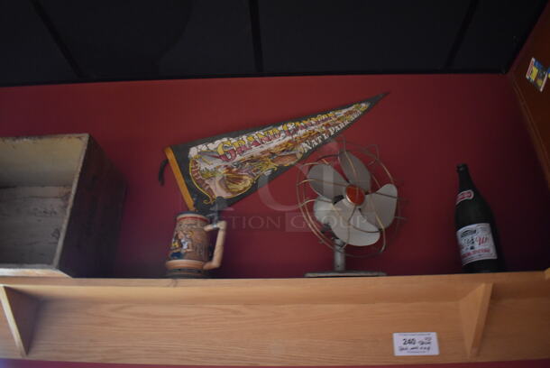 ALL ONE MONEY! Shelf Lot of Various Items Including Fan and Crates and Wall Decor Above The Shelf. Does Not Include The Shelf Itself. BUYER MUST REMOVE. (Party Dining Room) - Image 2 of 7