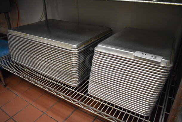ALL ONE MONEY! Tier Lot of Various Items Including Half and Full Metal Baking Pans. 13x18x1, 18x26x1. (Kitchen) - Image 1 of 4