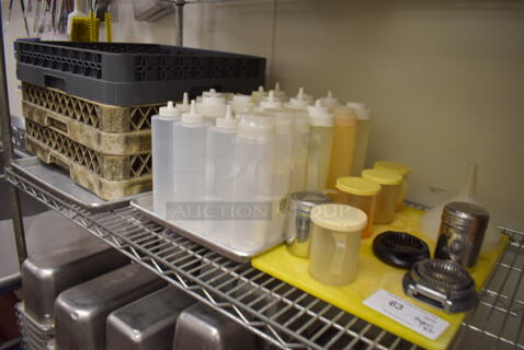 ALL ONE MONEY! Tier Lot of Various Items Including Dish Caddies, Poly Condiment Bottles and Seasoning Shakers. (Kitchen)