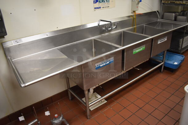 Stainless Steel Commercial 3 Bay Sink w/ Dual Drain Boards, Faucet and Handles. BUYER MUST REMOVE. (Kitchen)