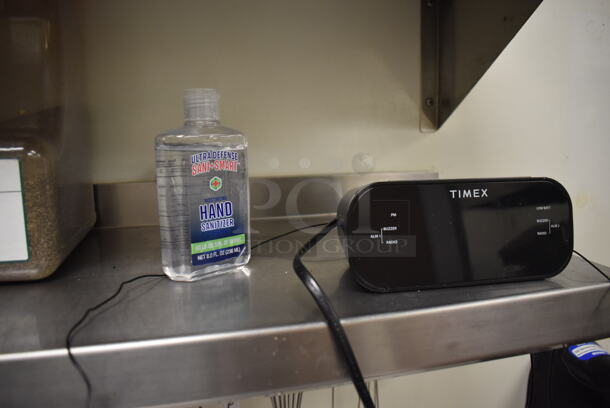 Stainless Steel Wall Mount Shelf w/ Contents Including Food Wrap. BUYER MUST REMOVE. (Kitchen) - Image 4 of 4