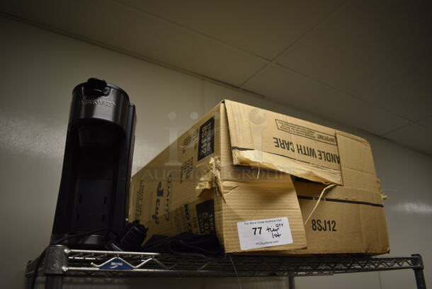 ALL ONE MONEY! Tier Lot of Various Items Including Disposable Cups and Coffee Machine. (Kitchen) - Image 1 of 4