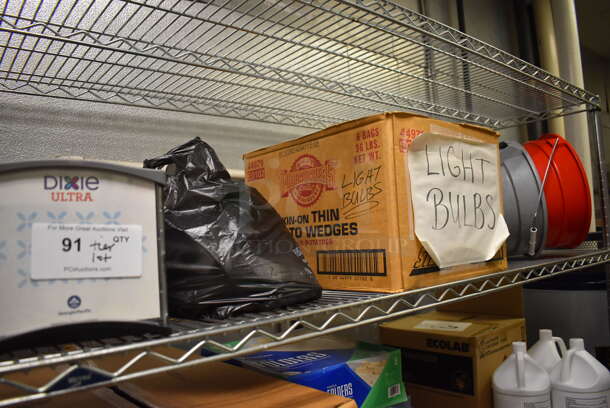 ALL ONE MONEY! Tier Lot of Various Items Including Light Bulbs, Napkin Dispenser and Poly Bucket. (Kitchen) - Image 1 of 6