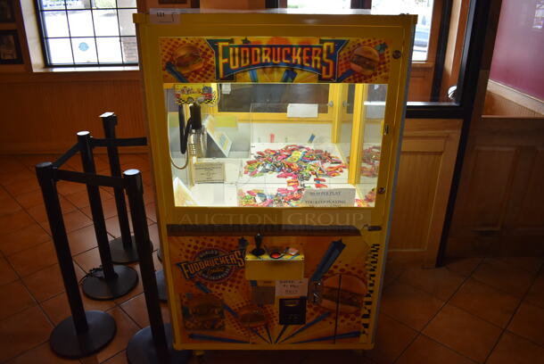 Coast to Coast Entertainment Metal Commercial Floor Style Claw Machine Arcade Game on Commercial Casters. Unit Was In Working Condition When Restaurant Closed. BUYER MUST REMOVE. (Lobby)  - Image 2 of 11