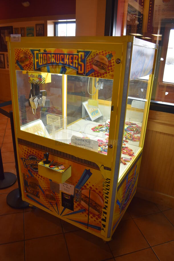 Coast to Coast Entertainment Metal Commercial Floor Style Claw Machine Arcade Game on Commercial Casters. Unit Was In Working Condition When Restaurant Closed. BUYER MUST REMOVE. (Lobby)  - Image 3 of 11