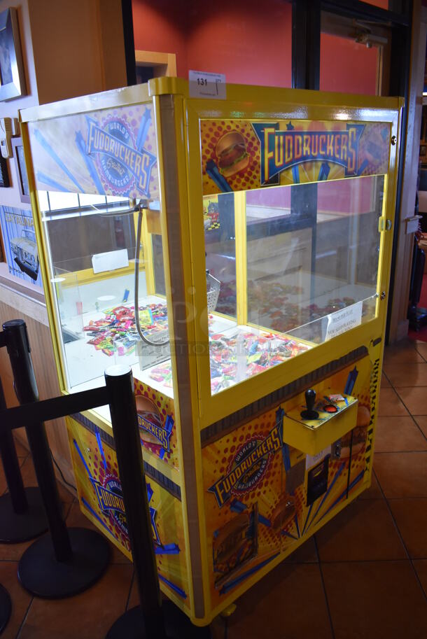 Coast to Coast Entertainment Metal Commercial Floor Style Claw Machine Arcade Game on Commercial Casters. Unit Was In Working Condition When Restaurant Closed. BUYER MUST REMOVE. (Lobby)  - Image 6 of 11
