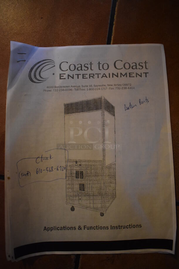 Coast to Coast Entertainment Metal Commercial Floor Style Claw Machine Arcade Game on Commercial Casters. Unit Was In Working Condition When Restaurant Closed. BUYER MUST REMOVE. (Lobby)  - Image 11 of 11