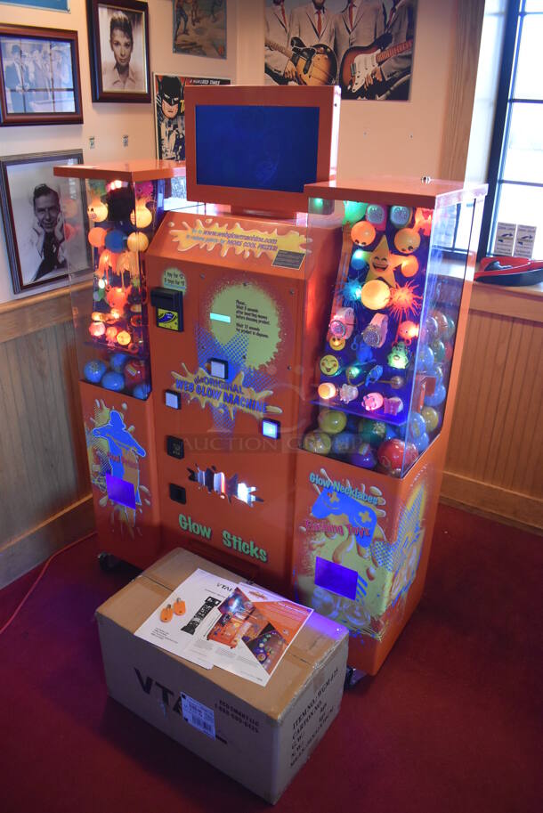 VTail Metal Commercial Floor Style Web Glow Toy Vending Machine on Commercial Casters. Comes w/ Box of Extra Toys. Unit Was In Working Condition When Restaurant Closed. BUYER MUST REMOVE. (Dining Room) - Image 2 of 12