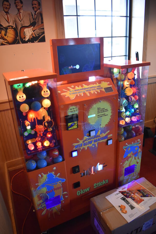 VTail Metal Commercial Floor Style Web Glow Toy Vending Machine on Commercial Casters. Comes w/ Box of Extra Toys. Unit Was In Working Condition When Restaurant Closed. BUYER MUST REMOVE. (Dining Room) - Image 4 of 12