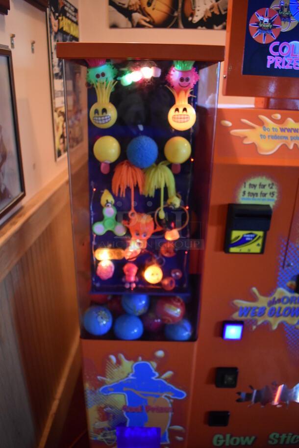 VTail Metal Commercial Floor Style Web Glow Toy Vending Machine on Commercial Casters. Comes w/ Box of Extra Toys. Unit Was In Working Condition When Restaurant Closed. BUYER MUST REMOVE. (Dining Room) - Image 5 of 12