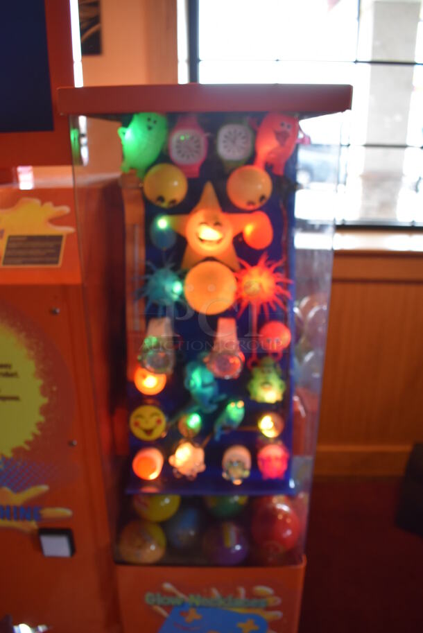VTail Metal Commercial Floor Style Web Glow Toy Vending Machine on Commercial Casters. Comes w/ Box of Extra Toys. Unit Was In Working Condition When Restaurant Closed. BUYER MUST REMOVE. (Dining Room) - Image 6 of 12