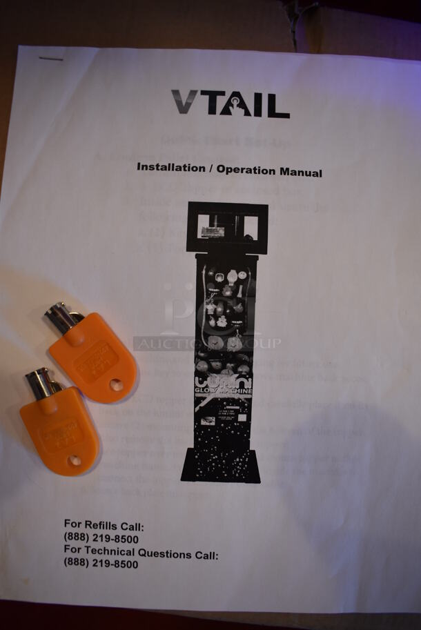 VTail Metal Commercial Floor Style Web Glow Toy Vending Machine on Commercial Casters. Comes w/ Box of Extra Toys. Unit Was In Working Condition When Restaurant Closed. BUYER MUST REMOVE. (Dining Room) - Image 11 of 12