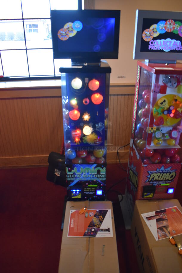 Lumini Metal Commercial Floor Style Glow Toy Vending Machine w/ Cash Acceptor. Comes w/ Box of Extra Toys. 110 Volts, 1 Phase. Unit Was In Working Condition When Restaurant Closed. BUYER MUST REMOVE. (Dining Room) - Image 2 of 9