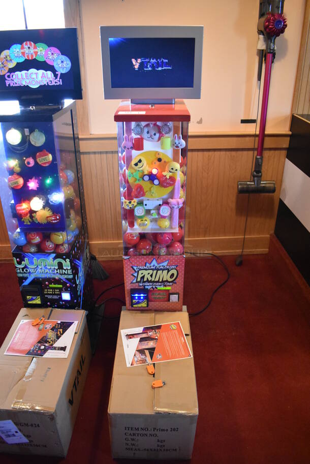 Lumini Metal Commercial Floor Style Glow Toy Vending Machine w/ Cash Acceptor. Comes w/ Box of Extra Toys. 110 Volts, 1 Phase. Unit Was In Working Condition When Restaurant Closed. BUYER MUST REMOVE. (Dining Room) - Image 2 of 8