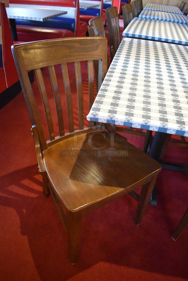 Table w/ Table Cloth on Black Metal Table Base and 4 Wooden Dining Chairs. Stock Picture - Cosmetic Condition May Vary. 48x48x30, 18x16x36. (Dining Room) - Image 5 of 5
